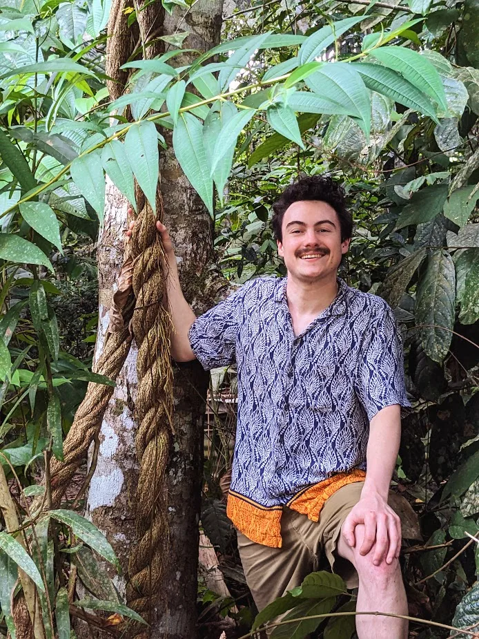 Portrait of Taylor Sterling in a forest setting